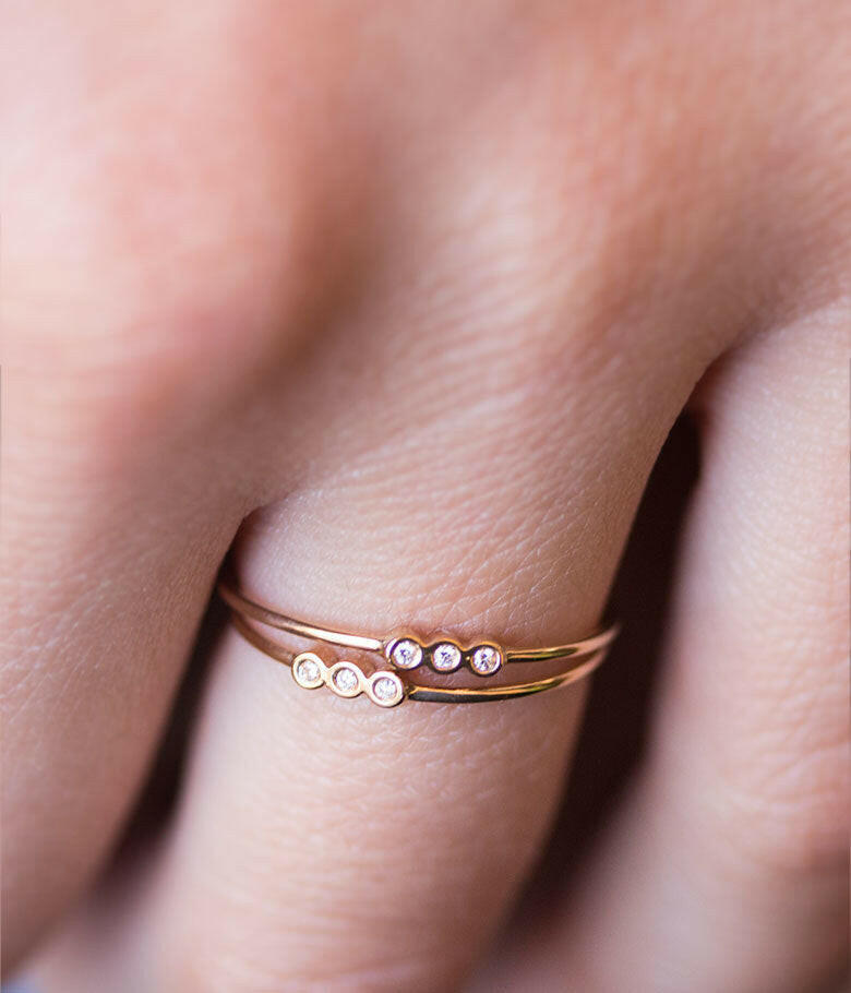 18k Gold Triple Ring and Zircon Bracelets